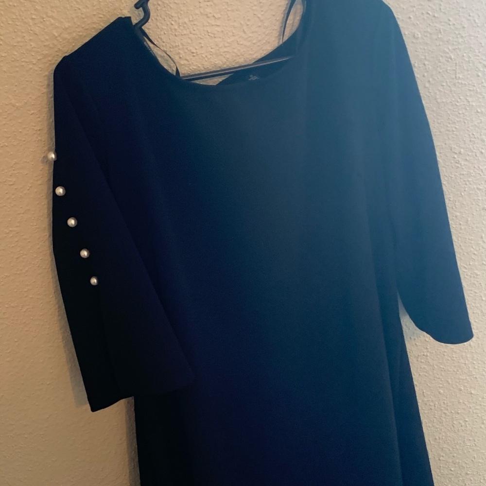 Beautiful black dress, sleeve detailing!